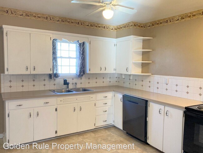 Building Photo - 2 br, 1 bath House - 1018 E 16th Ave