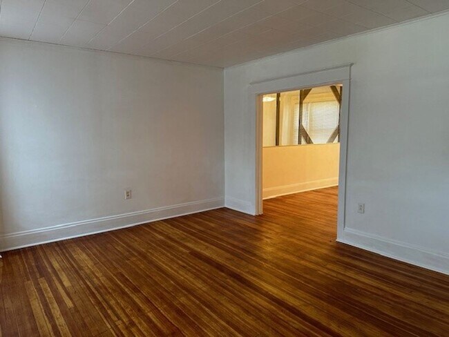 Building Photo - Welcome to this charming 2-bedroom plus bo...