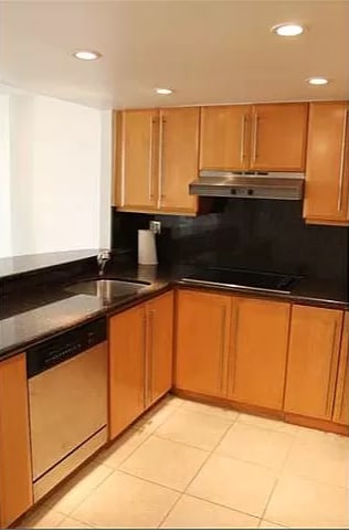Kitchen with pass-through to the living room - 600 NE 36th St