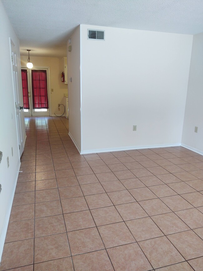 View to dining area & patio door - 251 Knight Dr