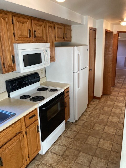 Kitchen looking toward In-Unit Laundry and Bathroom - 1625 County Park Rd