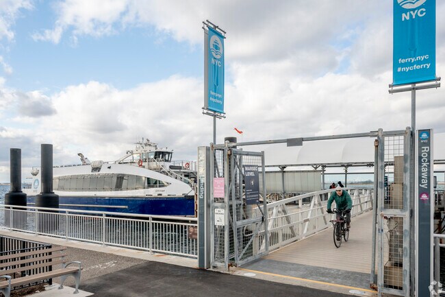 The NYC ferry stops right in Rockaway Beach for easy access to scenic views of Manhattan.