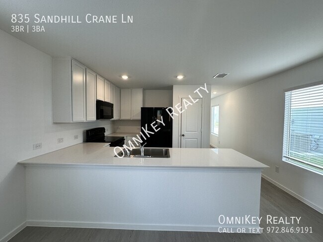 Foto del edificio - 835 Sandhill Crane Ln