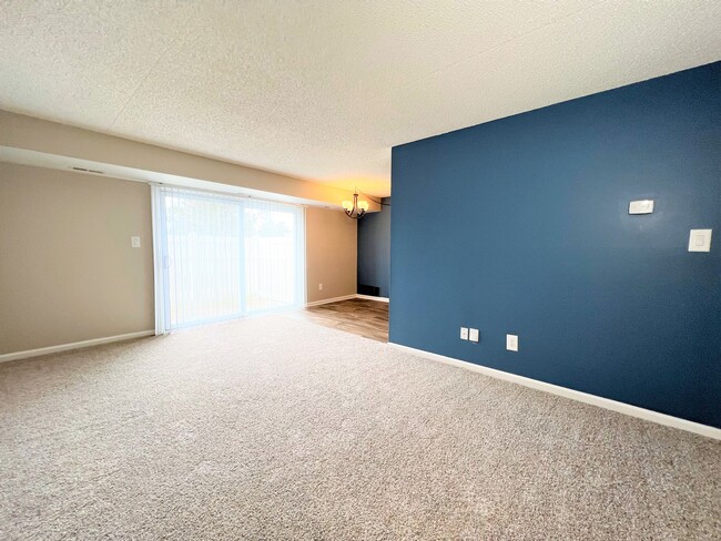 Living Room - Renovated - Waterview Farms Apartments