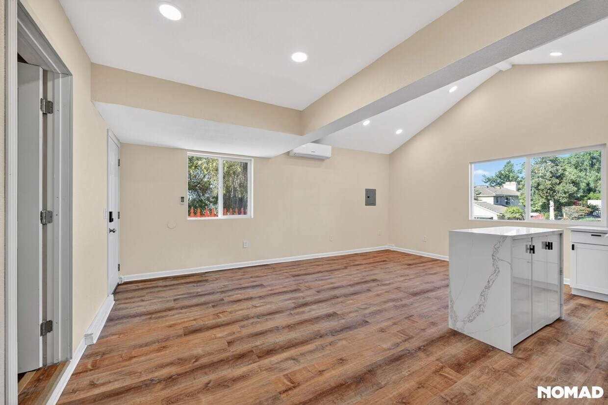 Primary Photo - Bright & Modern 2-Bed Home with Ocean Glimpses in Prime Vista Location