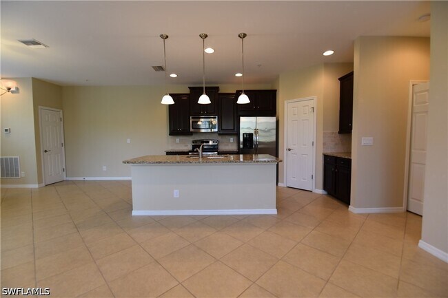 Building Photo - 8560 Evernia Ct