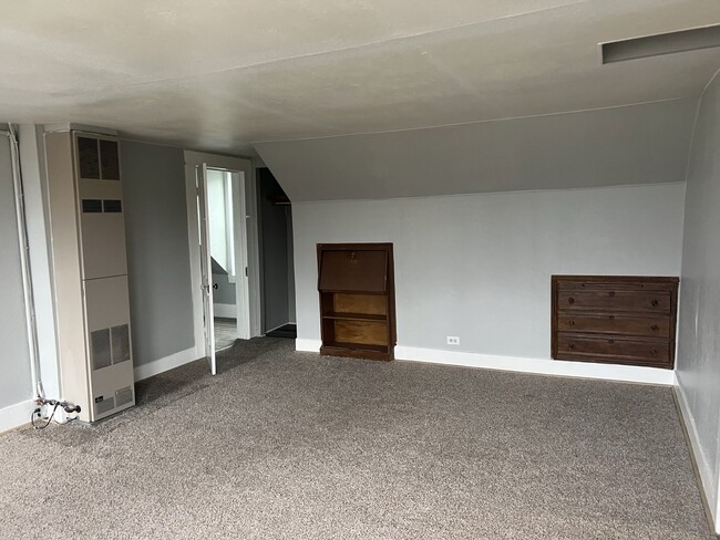 Living room with builtin desk and builtin drawers - 105 E Dowland St