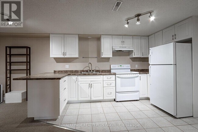 Photo du bâtiment - 415 Norrie Crescent