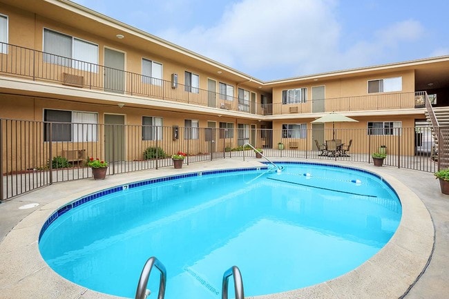 Pool Area - Modern Lakeside Living | 1 & 2 Bedroom Apartments with Parking and Pool!