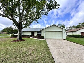 Building Photo - 4818 Breezy Palms Ct