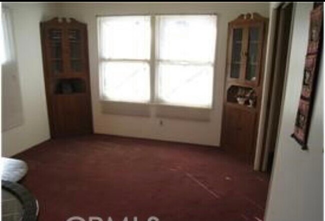Building Photo - 8715 Orangewood Ave