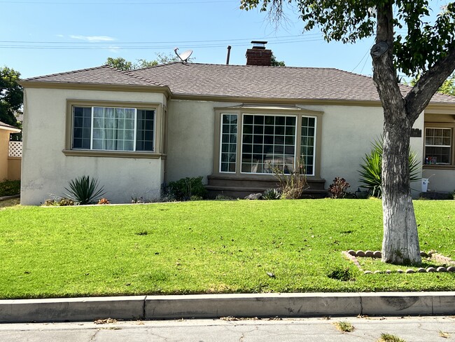 House Front - 709 E Valencia Ave
