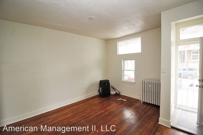Building Photo - 3 br, 1 bath House - 1609 E 28th St