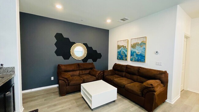 Building Photo - PRICE REDUCED! 1 Bedroom Semi Furnished in...