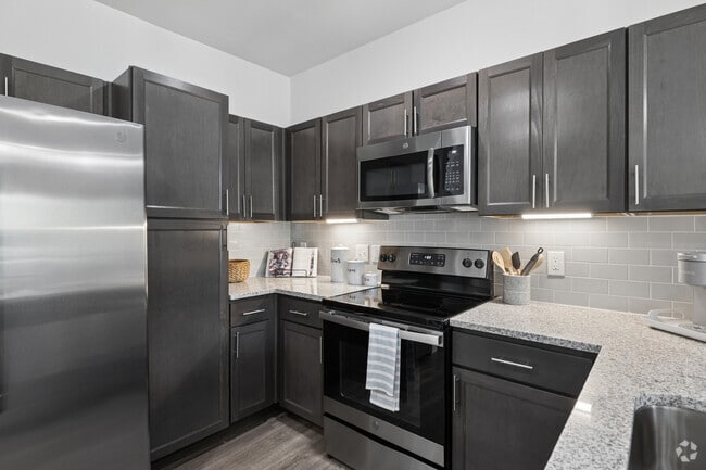 1BR, 1BA - 811SF - Kitchen - Sage Highland Creek 55+ Active Adult