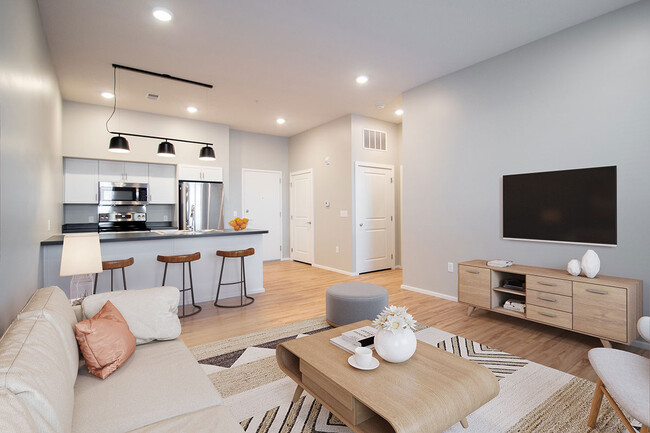 Sala de estar y cocina - Nobility Pointe