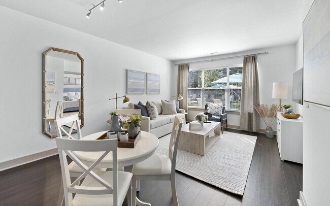Sala de estar de apartamento moderno conectada al comedor - The Landing at Vinnin Square