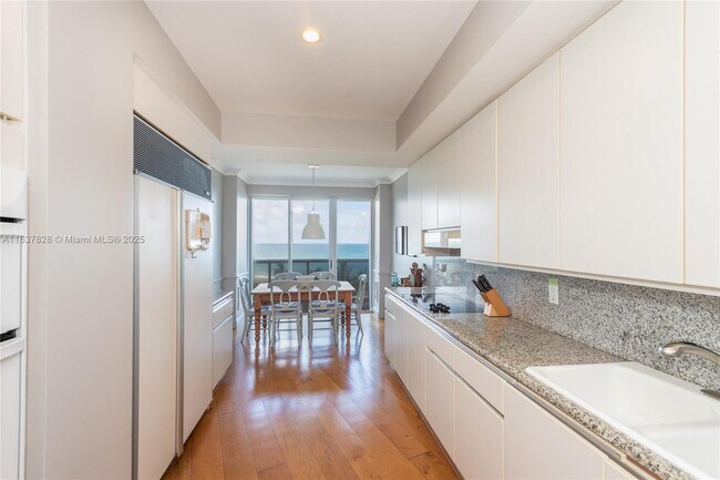 Building Photo - 9601 Collins Ave