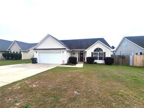 Building Photo - 5215 Woodpecker Dr