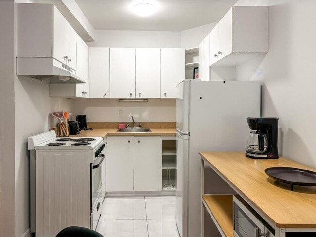 Photo du bâtiment - 720-720 Av. Marin