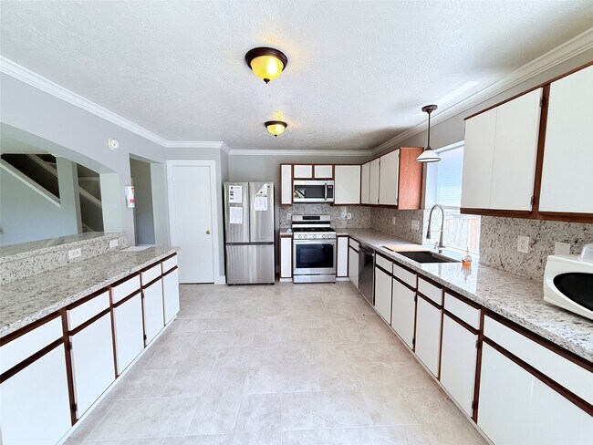 Foto del edificio - 1623 Stonehaven Village Cir