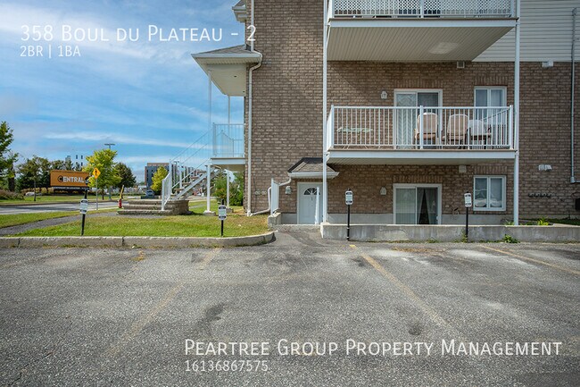 Building Photo - Luxury Apartment-Great Location in Gatinea...