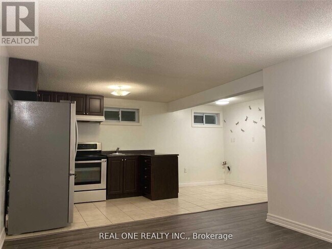 Photo du bâtiment - 73 Romfield Circuit