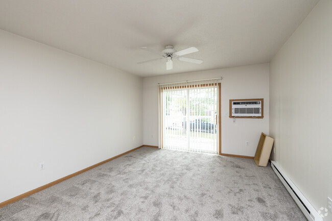 2BR, 2BA - 930SF - Living Room - Woodhaven Place II