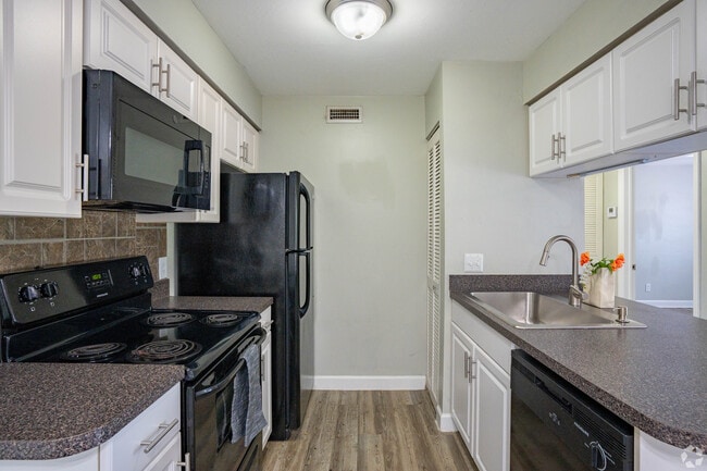 Building Photo - Seville Apartments. A Beautiful apartments is waiting for you to make it a Home. Great Specials T...
