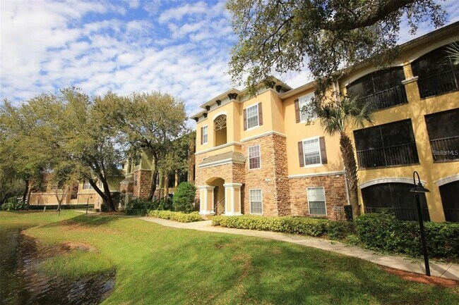 Building Photo - 10103 Courtney Palms Blvd