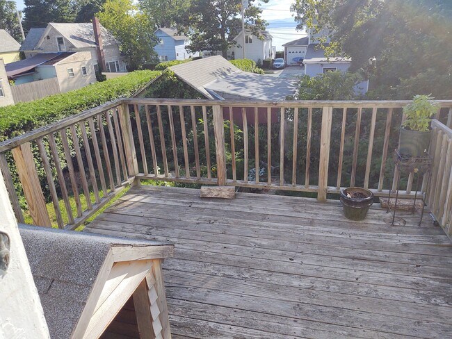 Private back deck with lake view - 207 North Ave
