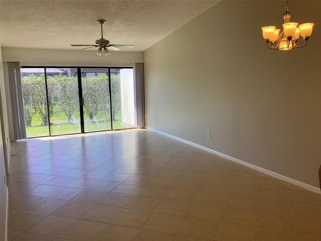 Building Photo - 10128 Boca Bend E