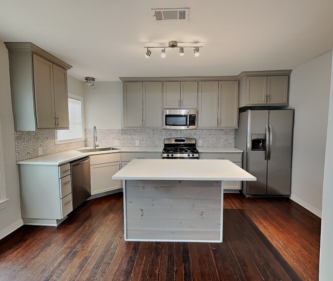 Building Photo - Designer Updates, Timeless Charm & an Unbeatable Fort Worth Location!