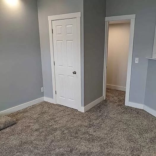 Lower Unit Bedroom 1 - 115 E Lima St