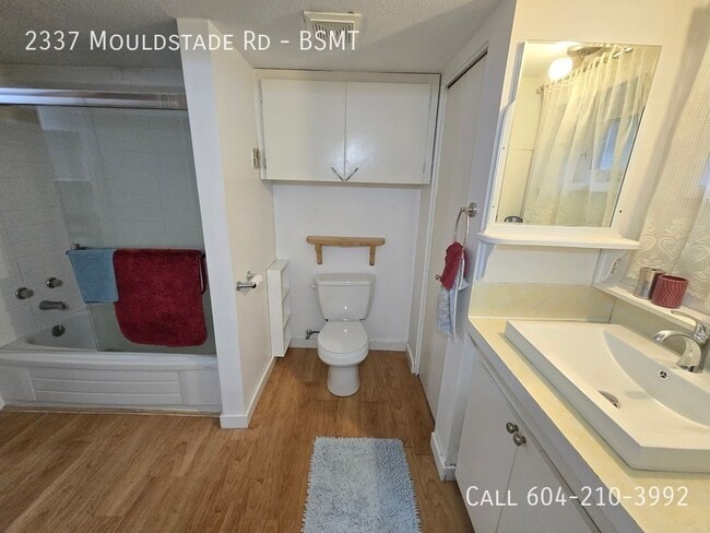 Photo du bâtiment - Cozy Basement Suite - Utilities Included
