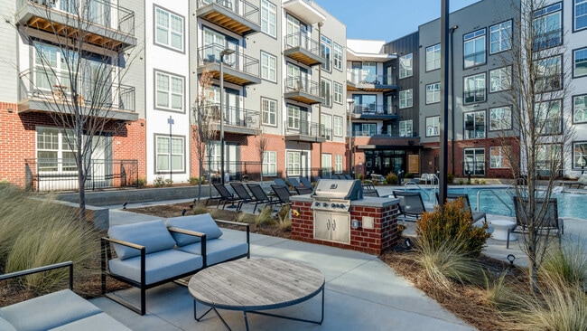 Outdoor Lounge with Grilling Area - Lyric Sugar Hill