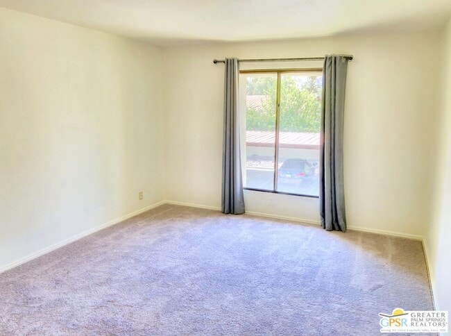Building Photo - 1655 E Palm Canyon Dr