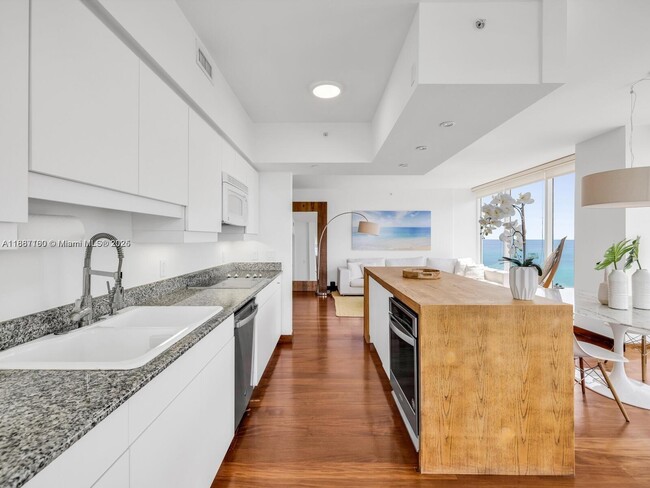 Building Photo - 4779 Collins Ave