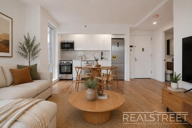 Building Photo - Light-Filled Corner 1BR with Private Outdoor Space & In-Unit Washer/Dryer