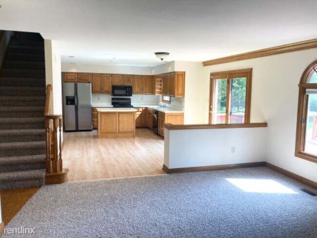 Building Photo - 4 br, 2.5 bath House - 9345 Moorings Blvd