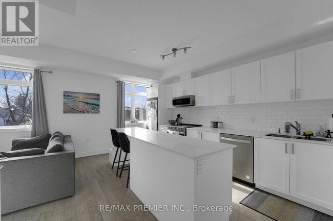 Building Photo - 1115 Douglas McCurdy Cmn