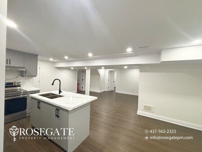 Photo du bâtiment - All-Inclusive 2-Bedroom Basement Apartment with 2 Parking Spaces – Hamilton