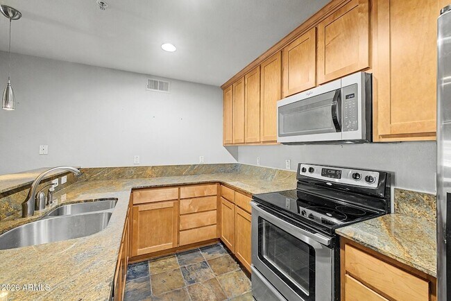 Foto del edificio - 4704 E Paradise Village Pkwy N