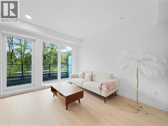 Photo du bâtiment - 133 W 49th Ave