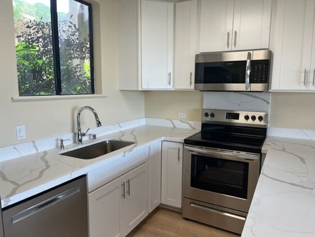 Building Photo - Poha Kea Point Townhome 3 bedrooms 2 bath with 2 parking