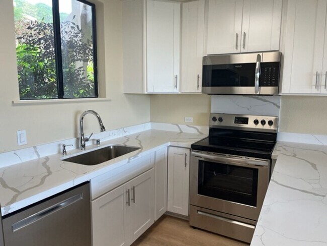 Foto del edificio - Poha Kea Point Townhome 3 bedrooms 2 bath with 2 parking