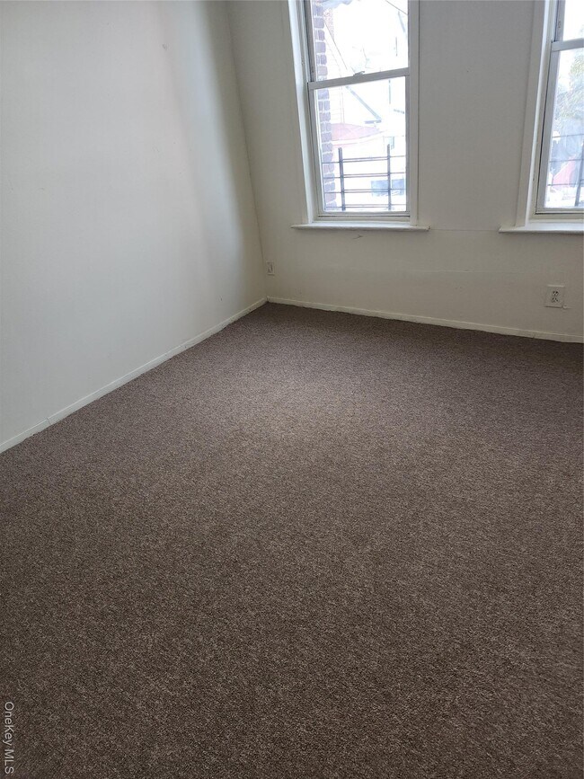 Building Photo - 205-11 Hollis Ave