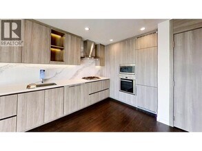 Building Photo - 4880 Lougheed Hwy.