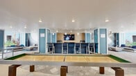 Located at 13645 E Colonial Dr in Orlando, FL, this single-floor community amenity space is designed as a vibrant social hub for residents. The layout encompasses several distinct activity and lounge zones, all unified by a modern coastal aesthetic featuring teal and blue accent walls, warm natural wood paneling, and durable stone-look tile flooring throughout.

A central bar-height counter with stylish woven barstools serves as a gathering focal point, complemented by pendant lighting and a wall-mounted flat-screen TV set against a natural wood backdrop. Recessed lighting illuminates the space efficiently throughout. A full-length shuffleboard table anchors the game area, while a ping-pong table provides additional recreational options near a large opening to the outdoor courtyard.

A cozy lounge nook features comfortable gray sofas arranged around a slatted wood coffee table, set beneath a dramatic large-format photographic wall mural and a ceiling fan. Striped navy rugs add a nautical touch to the seating area.

Decorative laser-cut wall panels frame a striking living green moss wall installation, adding a natural, textural element to one section of the space. The layout opens toward an outdoor courtyard with landscaped greenery, blurring the boundary between interior and exterior. Overall, the space offers a well-rounded, amenity-rich environment ideal for social interaction and recreation.