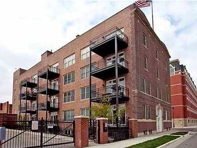 South side of building facing Interest Bank Arena. - 201 S Saint Francis Ave